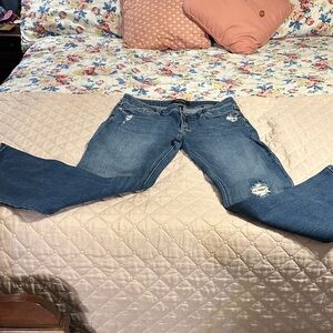 White House Black Market skinny Jeans in Blue with gold sequins accents.